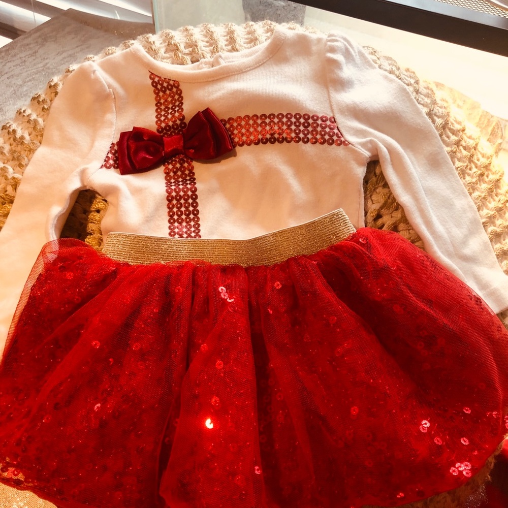 Baby girl with sparkling red tutu  6-9 months old